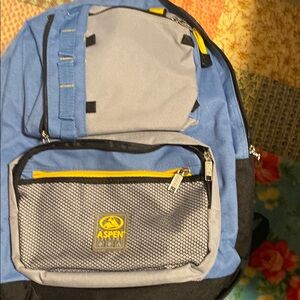 Stylish Blue and Gray Backpack with Textured Fabric